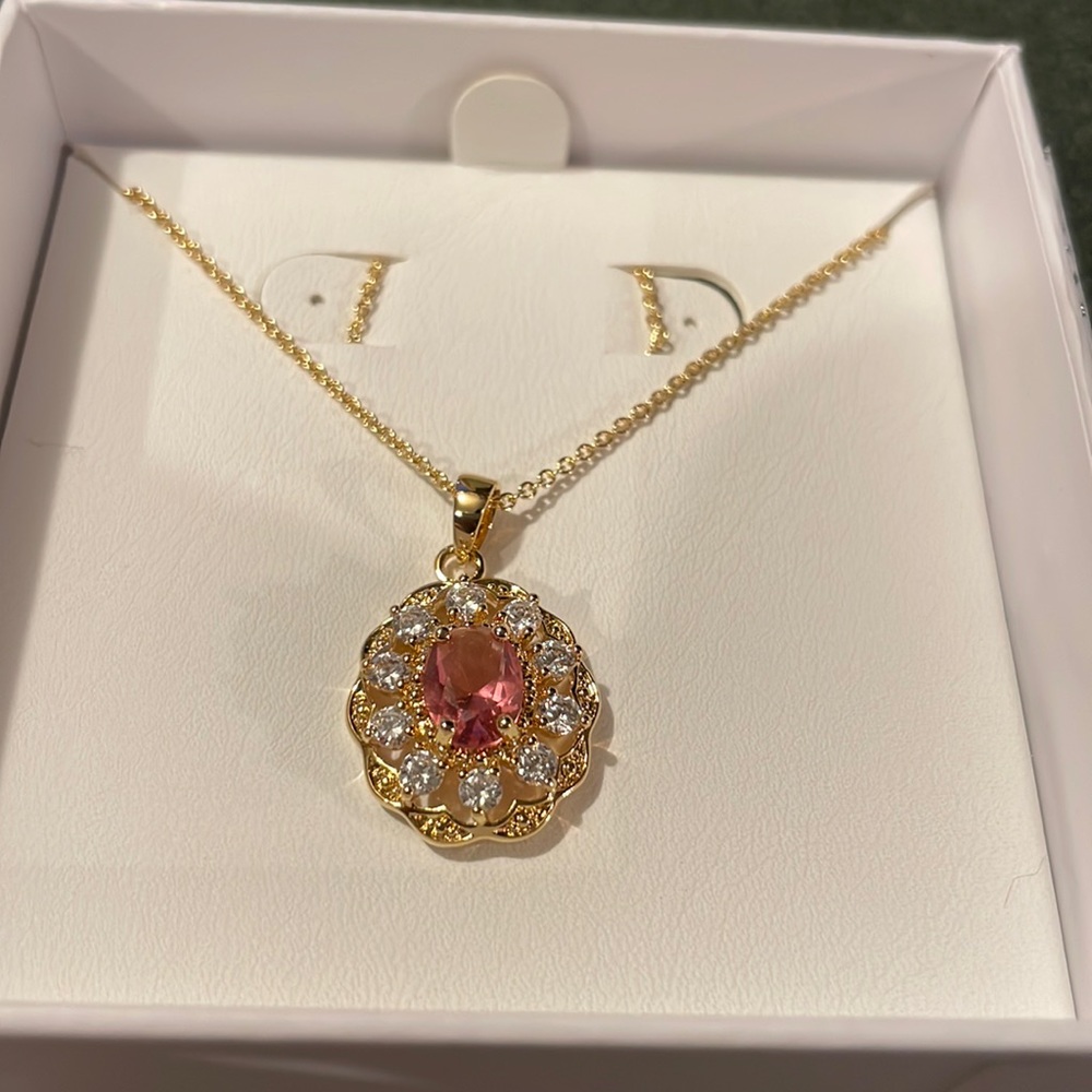 Bomb necklace:lab created dark pink topaz on a double 12k gold plated necklace